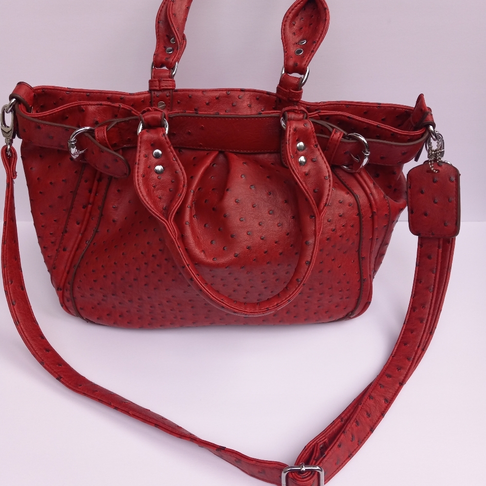 An red with black polka dot leather purse